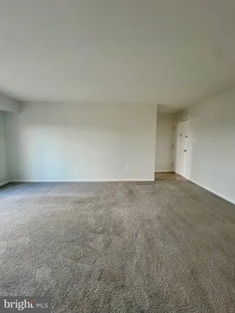 a view of a hallway with closet