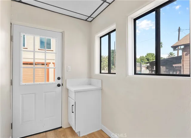 a bathroom with a sink and a window