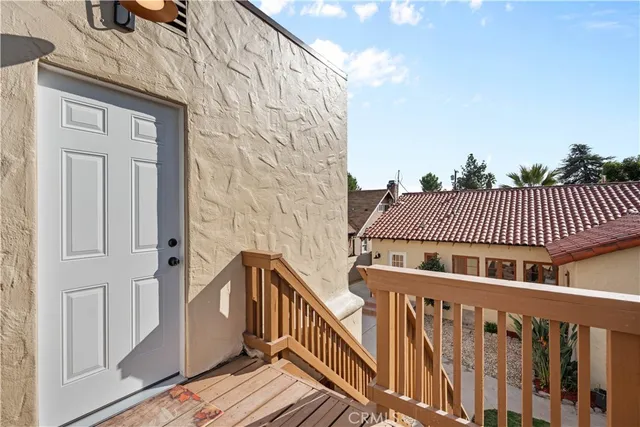 a kitchen with cabinets stainless steel appliances a sink and a stove