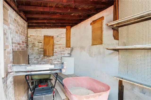 an aerial view of a houses with a yard