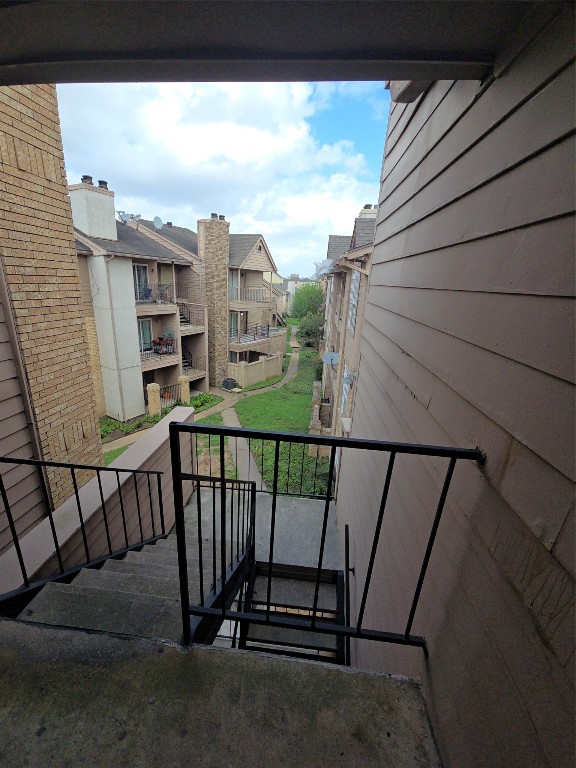 10101 South Gessner Road, Unit 708 Houston, TX 77071 - Photo 18 of 20 a view of a balcony with furniture