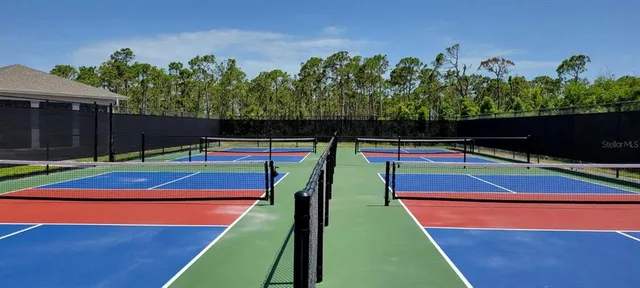 a tennis court that has tennis net