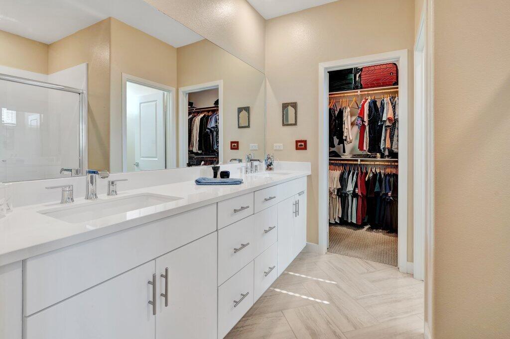 76345 Cornell Way Palm Desert, CA 92211 - Photo 18 of 47 a en suite bathroom with a double vanity sink