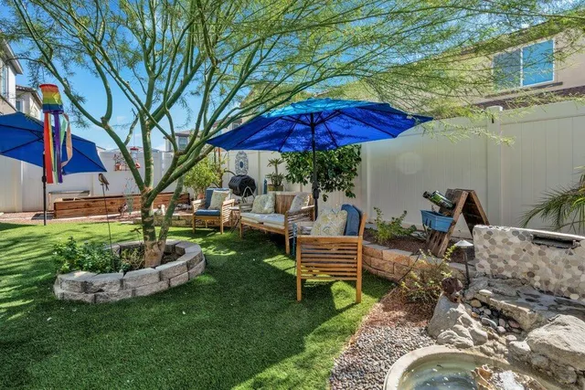 a backyard of a house with seating space