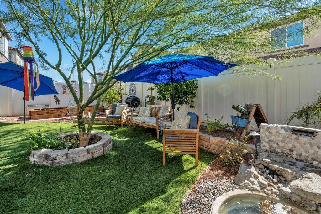 76345 Cornell Way Palm Desert, CA 92211 - Photo 32 of 47 a view of a house with backyard and sitting area