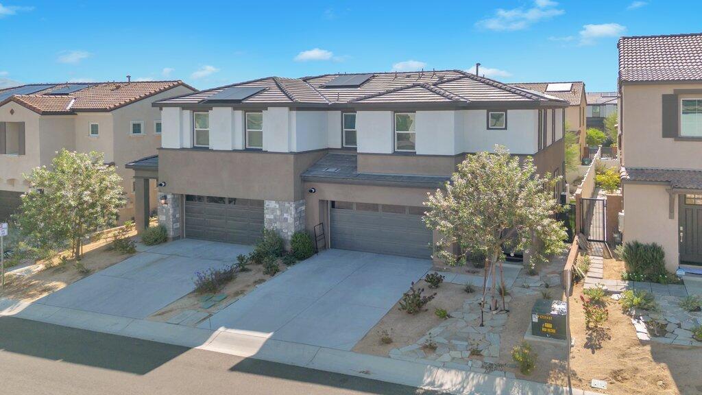 76345 Cornell Way Palm Desert, CA 92211 - Photo 36 of 47 a view of a house with a yard