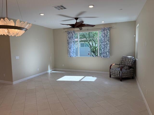 76345 Cornell Way Palm Desert, CA 92211 - Photo 7 of 47 a room with a bed and a chandelier