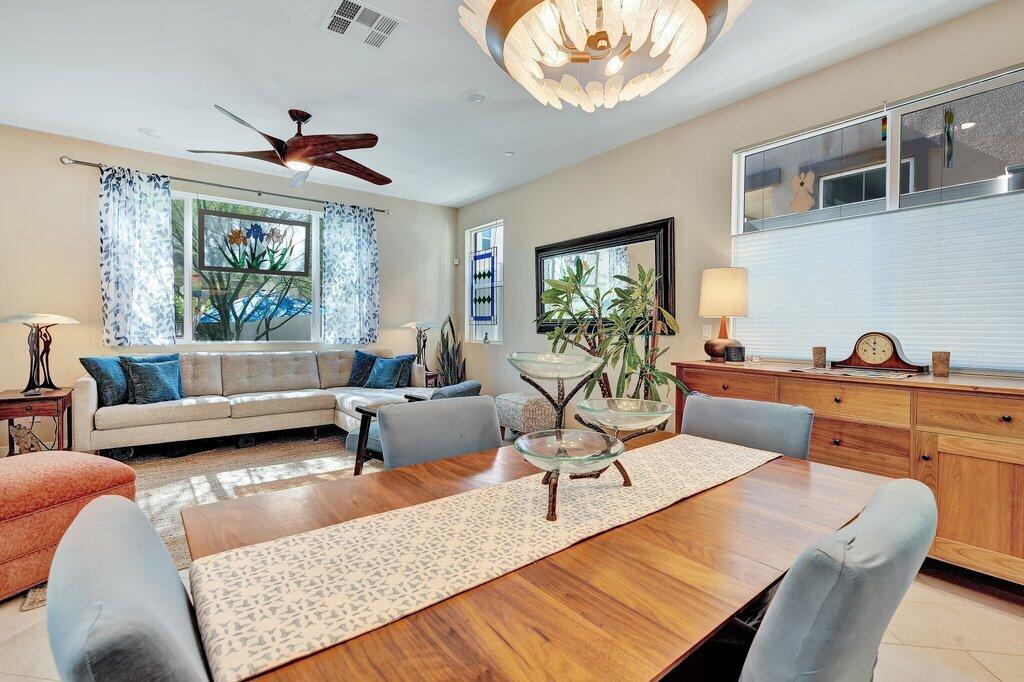 76345 Cornell Way Palm Desert, CA 92211 - Photo 8 of 47 a living room with furniture and a large window