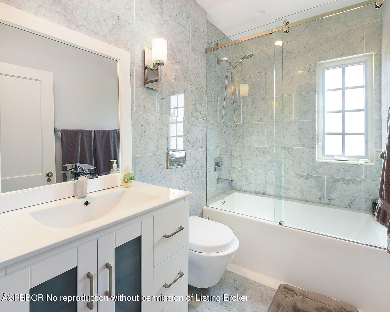 230 Rugby Road West Palm Beach, FL 33405 - Photo 13 of 13 a bathroom with a sink a toilet and shower