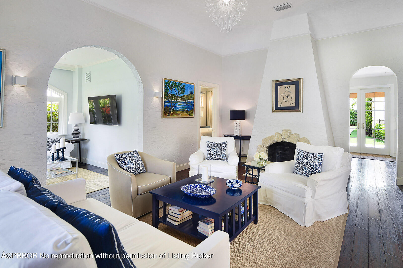 230 Rugby Road West Palm Beach, FL 33405 - Photo 2 of 13 a living room with furniture a rug and a fireplace