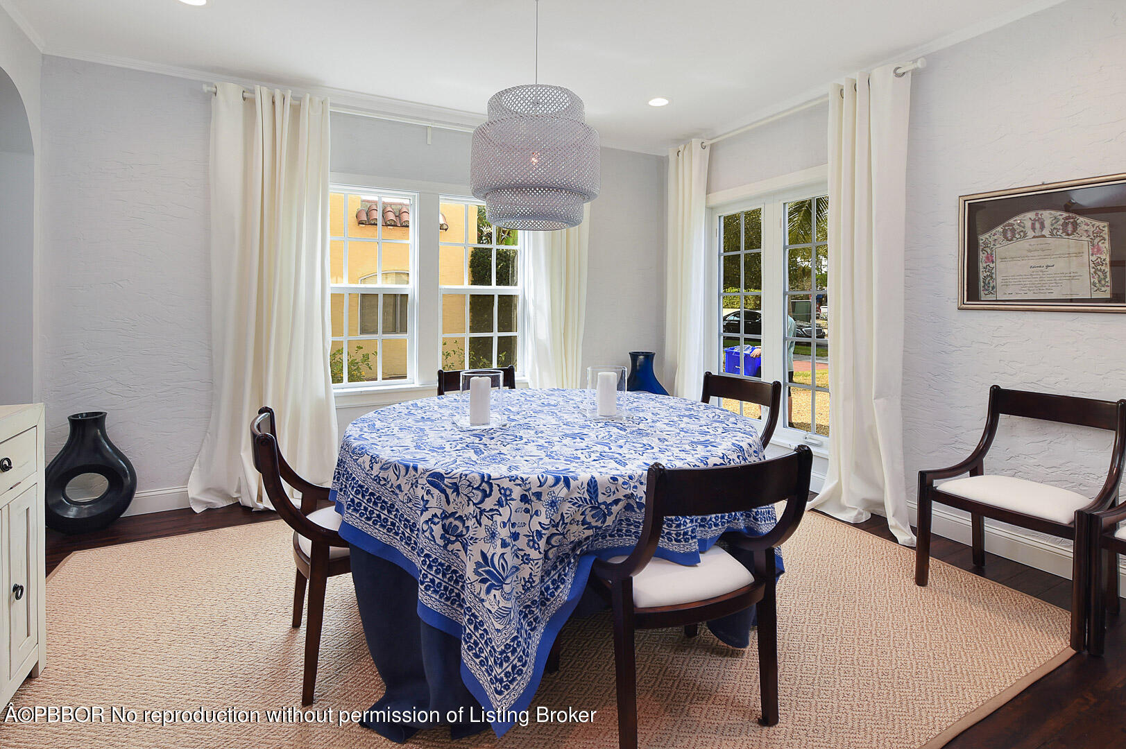230 Rugby Road West Palm Beach, FL 33405 - Photo 7 of 13 a dining room with a table chairs and a table