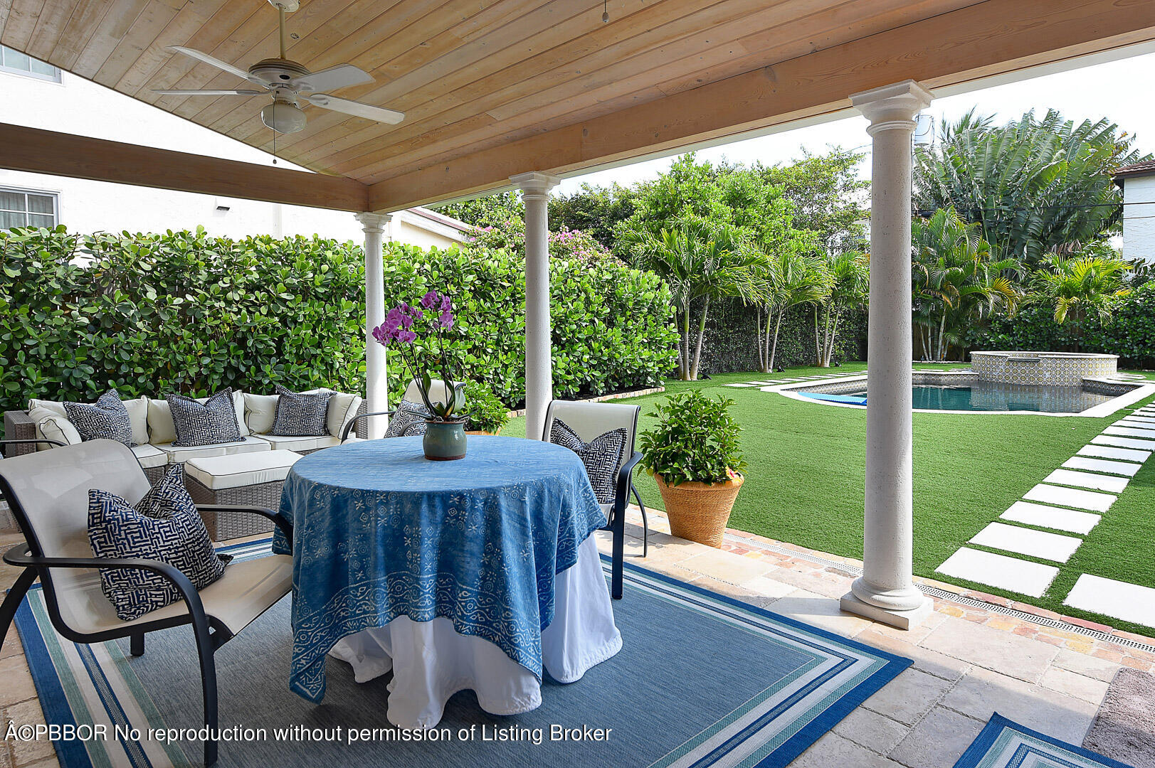 230 Rugby Road West Palm Beach, FL 33405 - Photo 10 of 13 a view of a patio with a table chairs and a patio