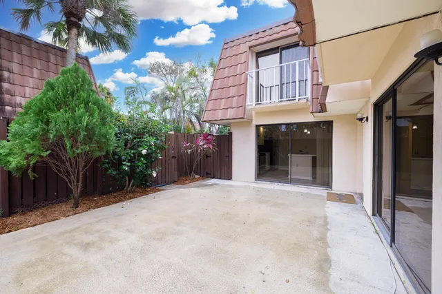 a view of a building with a garden