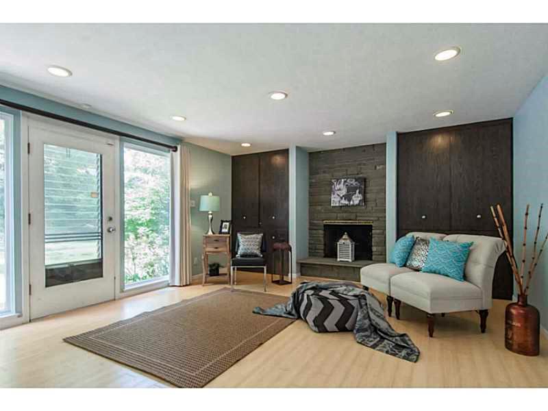 5145 Penton Road Pittsburgh, PA 15217 - Photo 12 of 25 Family Room. Family room features fire place and beautiful bamboo floors.