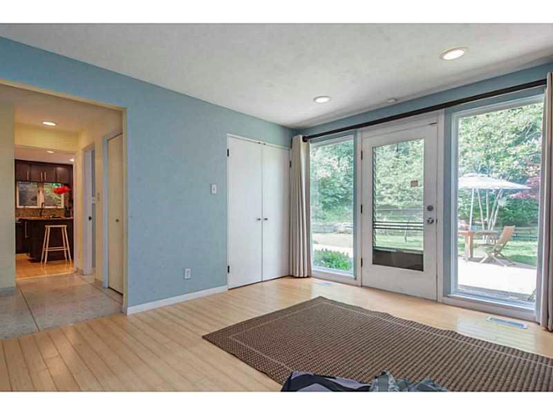 5145 Penton Road Pittsburgh, PA 15217 - Photo 13 of 25 Family Room. Large doors leading to the back yard.