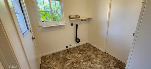 a bathroom with a sink and a window