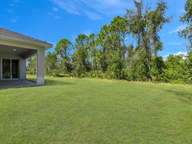 a view of outdoor space and yard