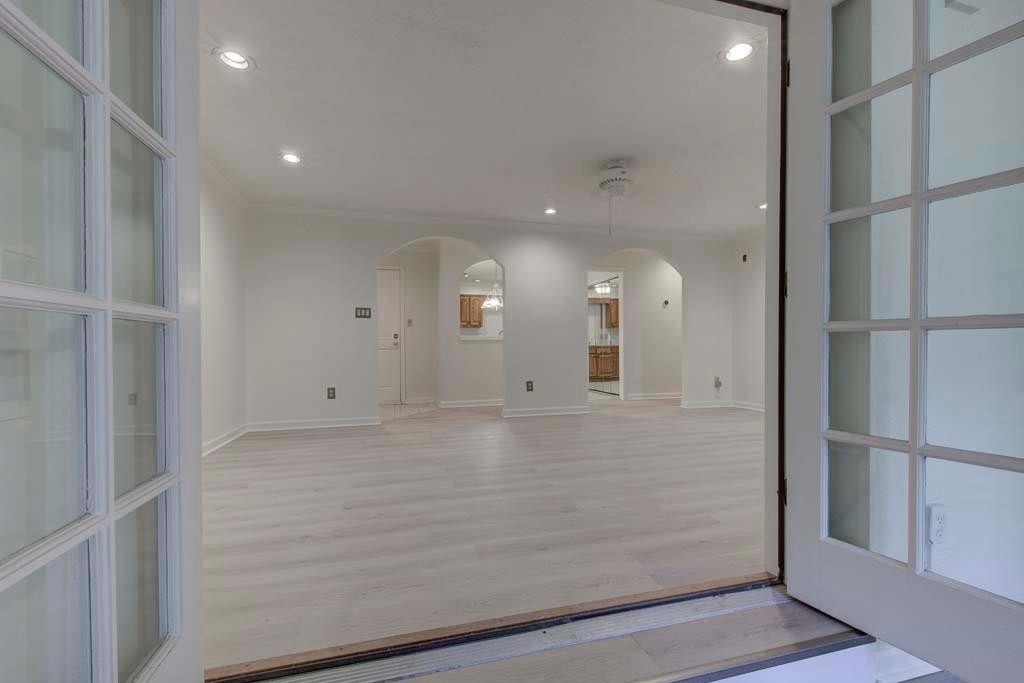 166 Maribeau Square Northwest Atlanta, GA 30327 - Photo 11 of 28 a view of a hallway with wooden floor