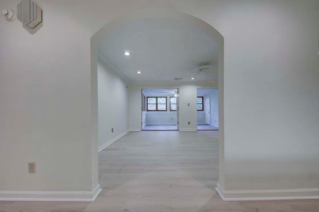 166 Maribeau Square Northwest Atlanta, GA 30327 - Photo 17 of 28 a view of a big room with wooden cabinet and windows