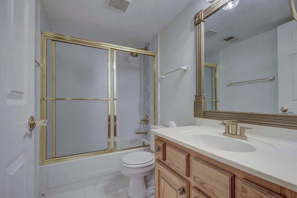 166 Maribeau Square Northwest Atlanta, GA 30327 - Photo 20 of 28 a bathroom with a sink toilet and shower