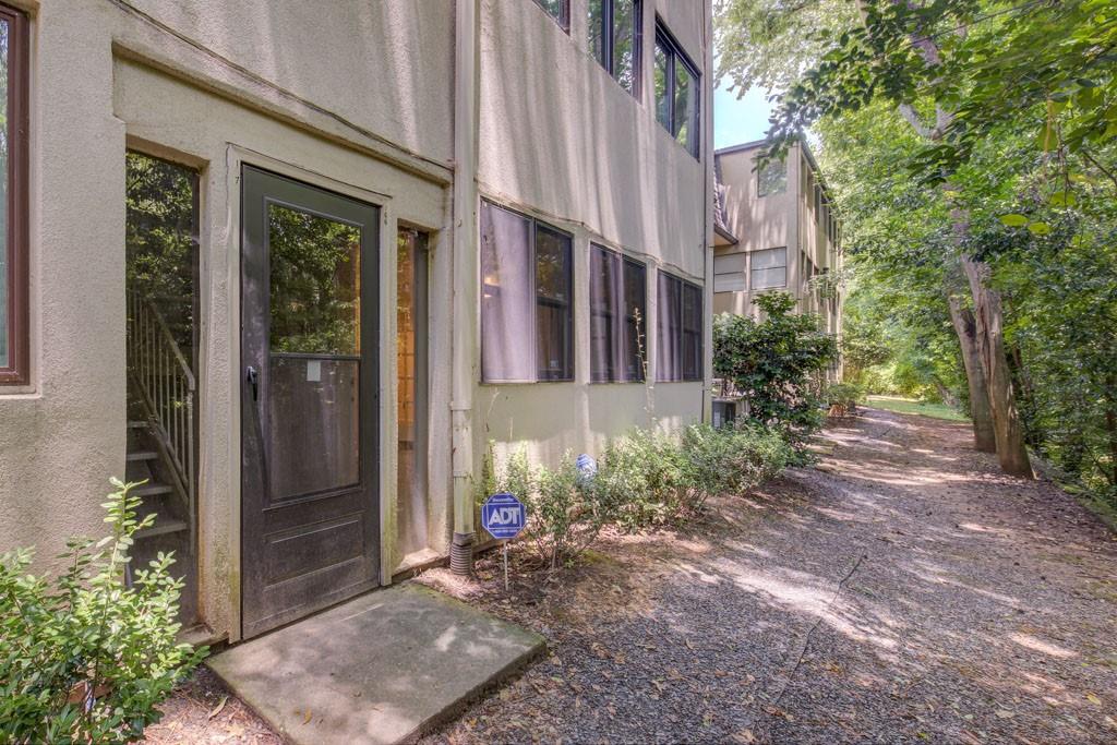 166 Maribeau Square Northwest Atlanta, GA 30327 - Photo 28 of 28 a view of a house with brick walls