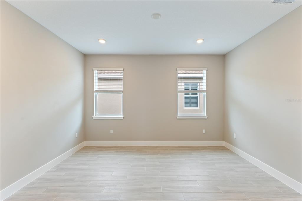 4516 Northwest 54th Terrace Ocala, FL 34482 - Photo 17 of 32 a view of an empty room with a window