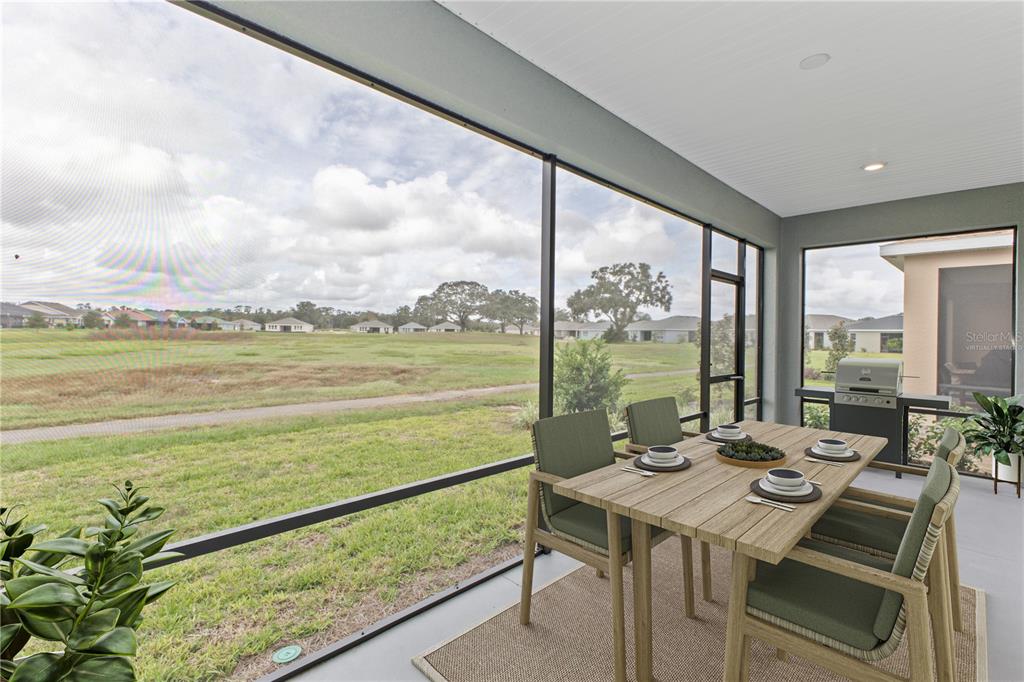 4516 Northwest 54th Terrace Ocala, FL 34482 - Photo 32 of 32 a view of a city from a dining room with furniture