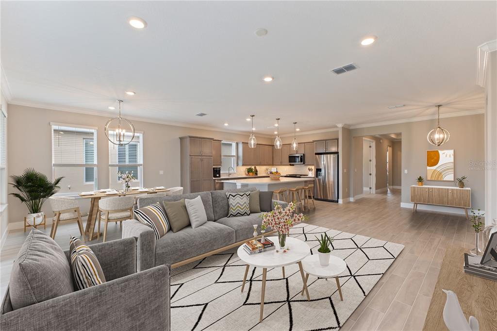 4516 Northwest 54th Terrace Ocala, FL 34482 - Photo 6 of 32 a living room with furniture kitchen view and a large window