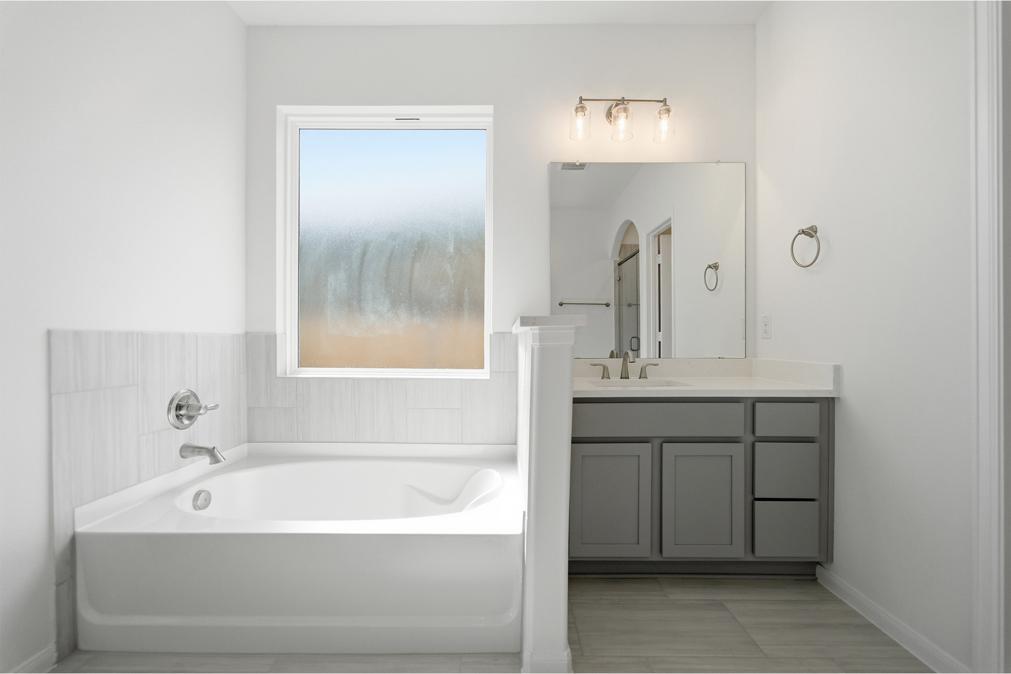 359 Grey Leaf Road Buda, TX 78610 - Photo 25 of 37 Full bathroom featuring vanity and a garden tub
