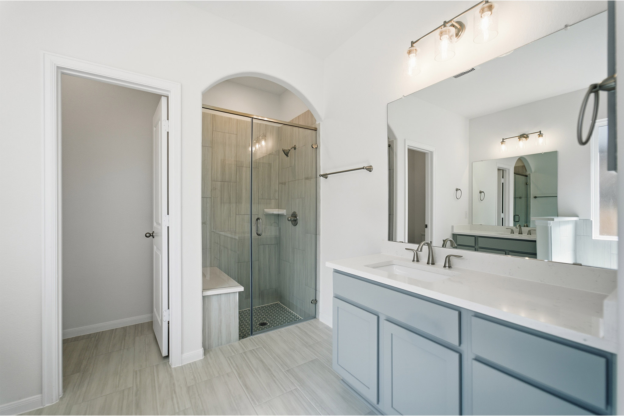 359 Grey Leaf Road Buda, TX 78610 - Photo 29 of 37 Bathroom with vanity and a shower stall
