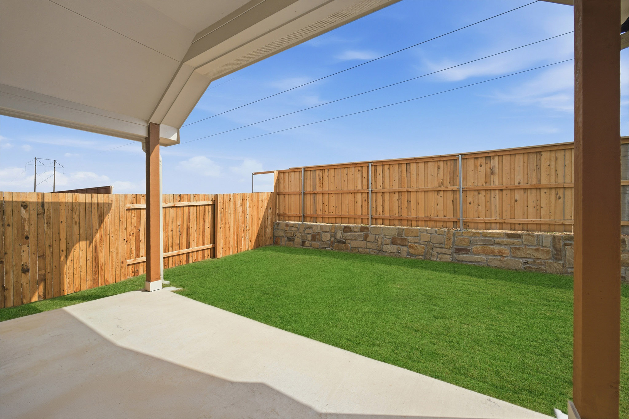 359 Grey Leaf Road Buda, TX 78610 - Photo 6 of 37 Fenced backyard with a patio area