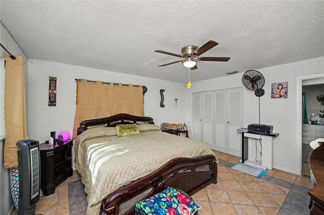 an aerial view of residential house with outdoor space and swimming pool