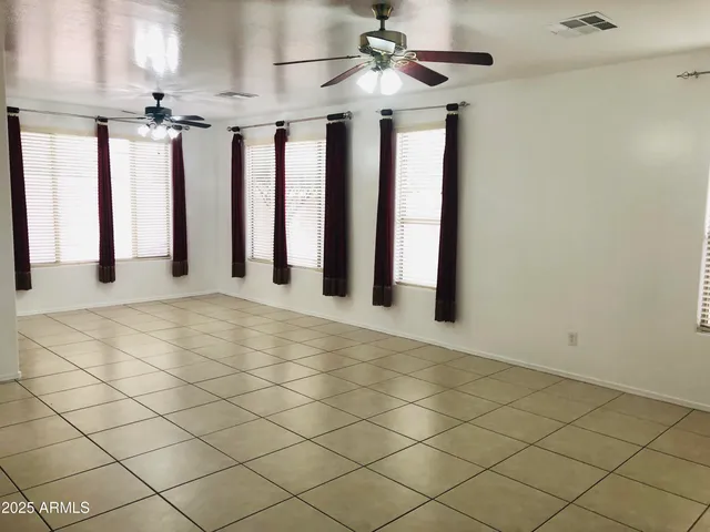 a kitchen with stainless steel appliances granite countertop a stove top oven a sink a counter top space and cabinets