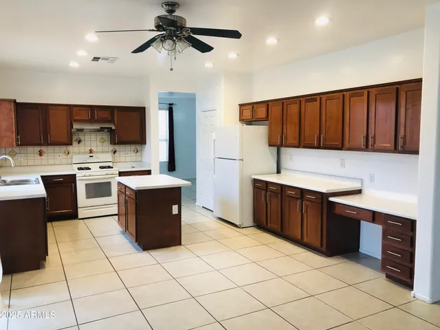 a view of staircase with white walls and windows