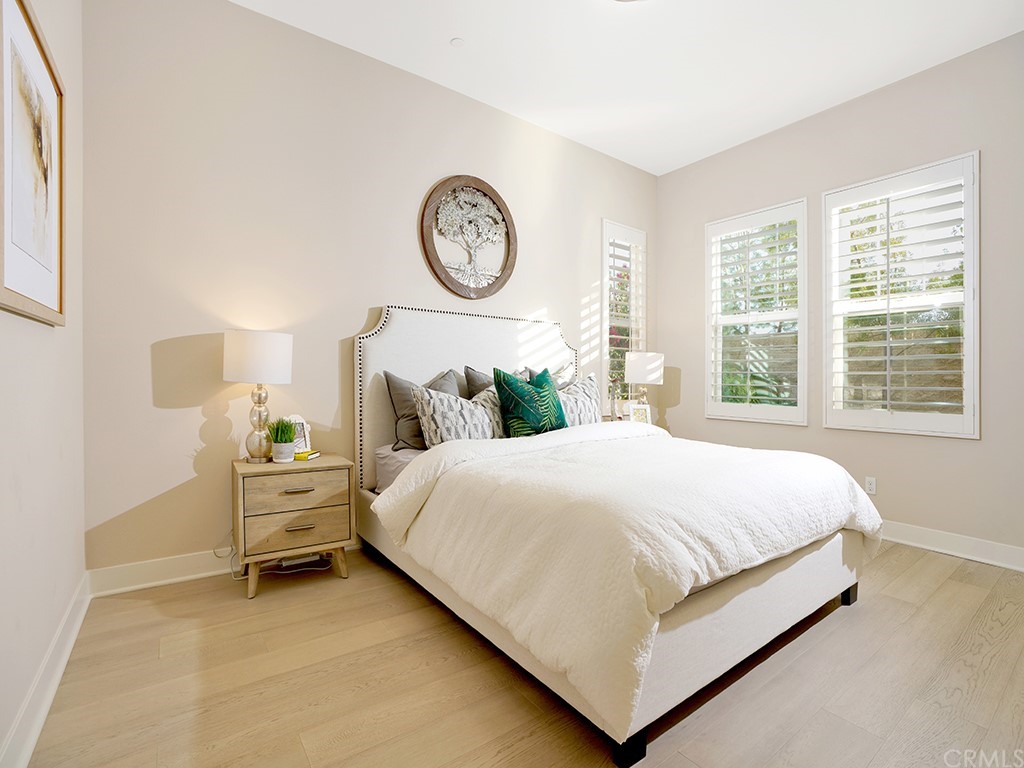 92 Iluna Irvine, CA 92618 - Photo 17 of 45 a bed sitting in a bedroom next to a window