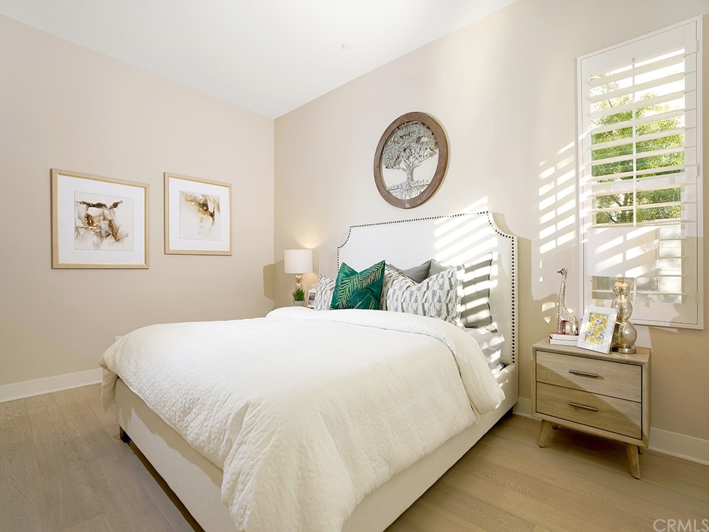 92 Iluna Irvine, CA 92618 - Photo 18 of 45 a bed sitting in a bedroom next to a window