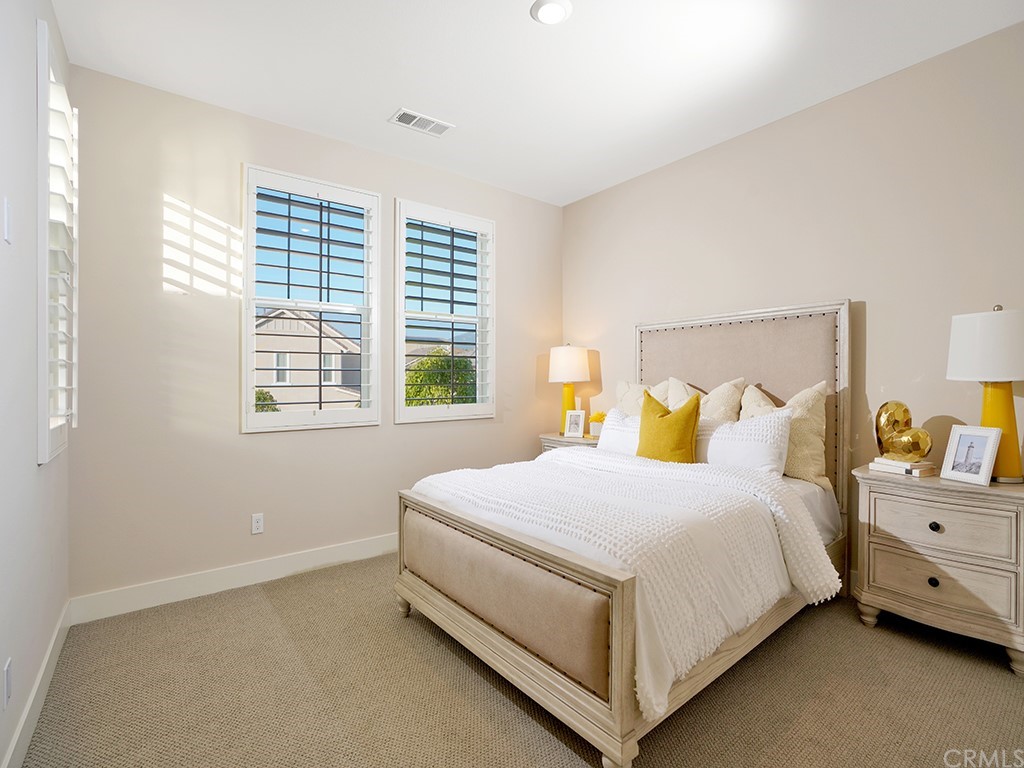 92 Iluna Irvine, CA 92618 - Photo 30 of 45 a bedroom with a bed and a window