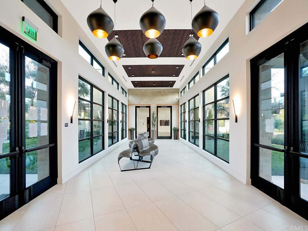 92 Iluna Irvine, CA 92618 - Photo 38 of 45 a living room with furniture windows and floor to ceiling window