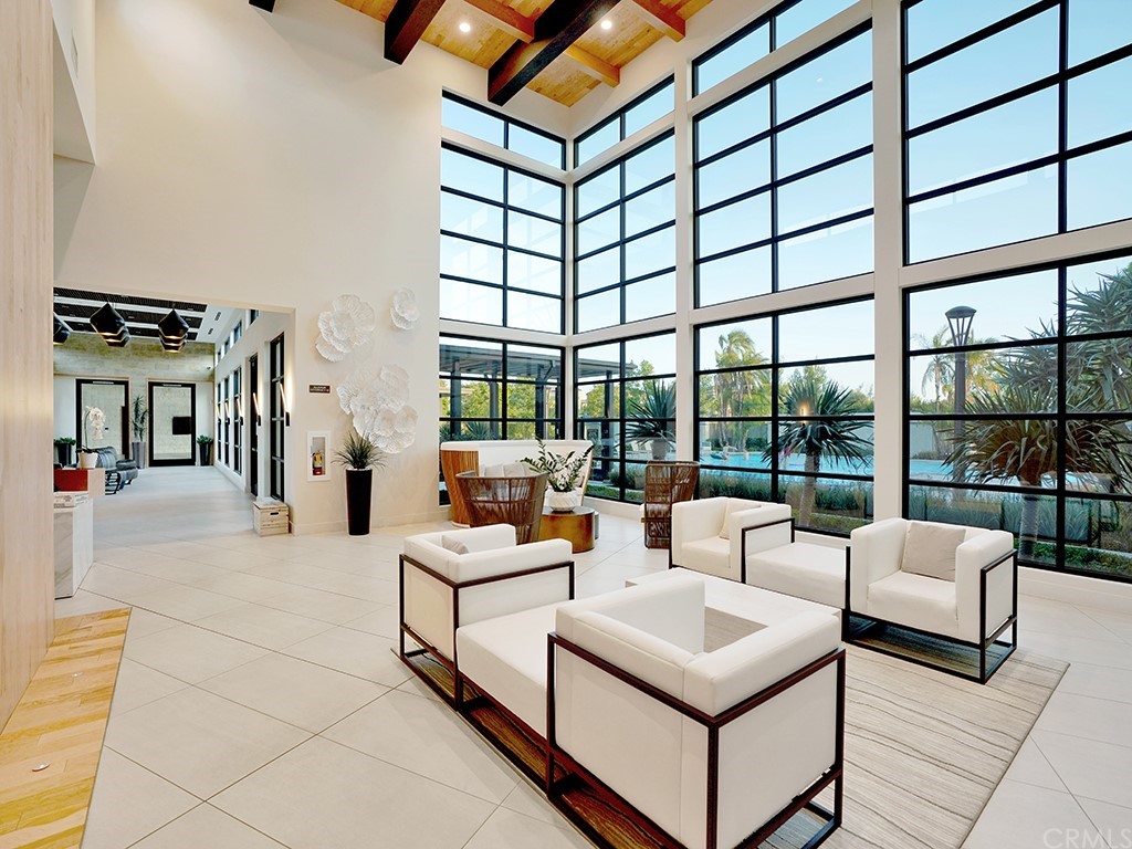 92 Iluna Irvine, CA 92618 - Photo 39 of 45 a living room with furniture and a floor to ceiling window