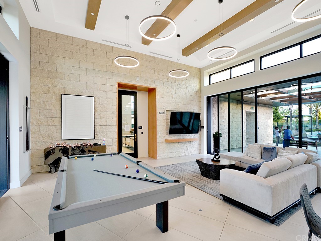 92 Iluna Irvine, CA 92618 - Photo 41 of 45 a living room with furniture and large windows