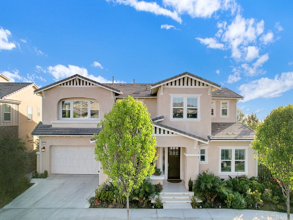 92 Iluna Irvine, CA 92618 - Photo 5 of 45 a front view of a house with a garden