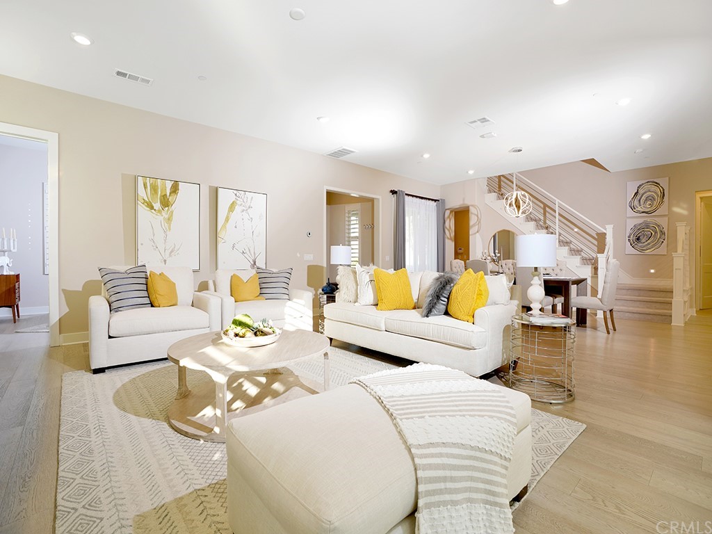 92 Iluna Irvine, CA 92618 - Photo 8 of 45 a living room with furniture and a large window