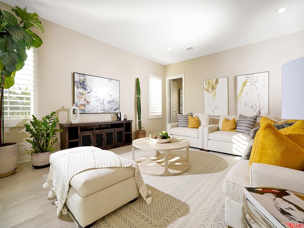 92 Iluna Irvine, CA 92618 - Photo 9 of 45 a living room with furniture and flowers