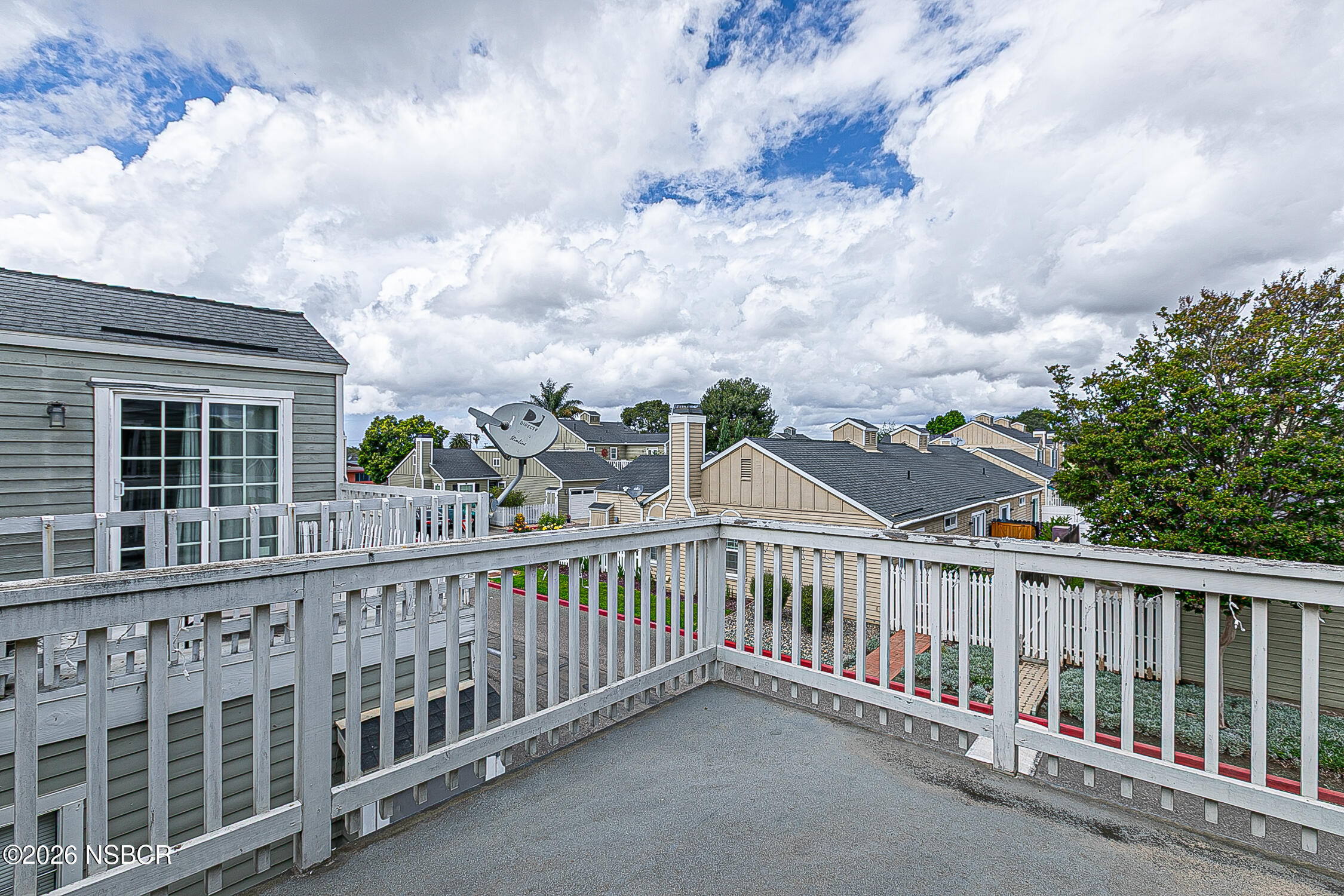 712 Pebble Beach Place Santa Maria, CA 93454 - Photo 18 of 31 a view of a balcony with wooden fence