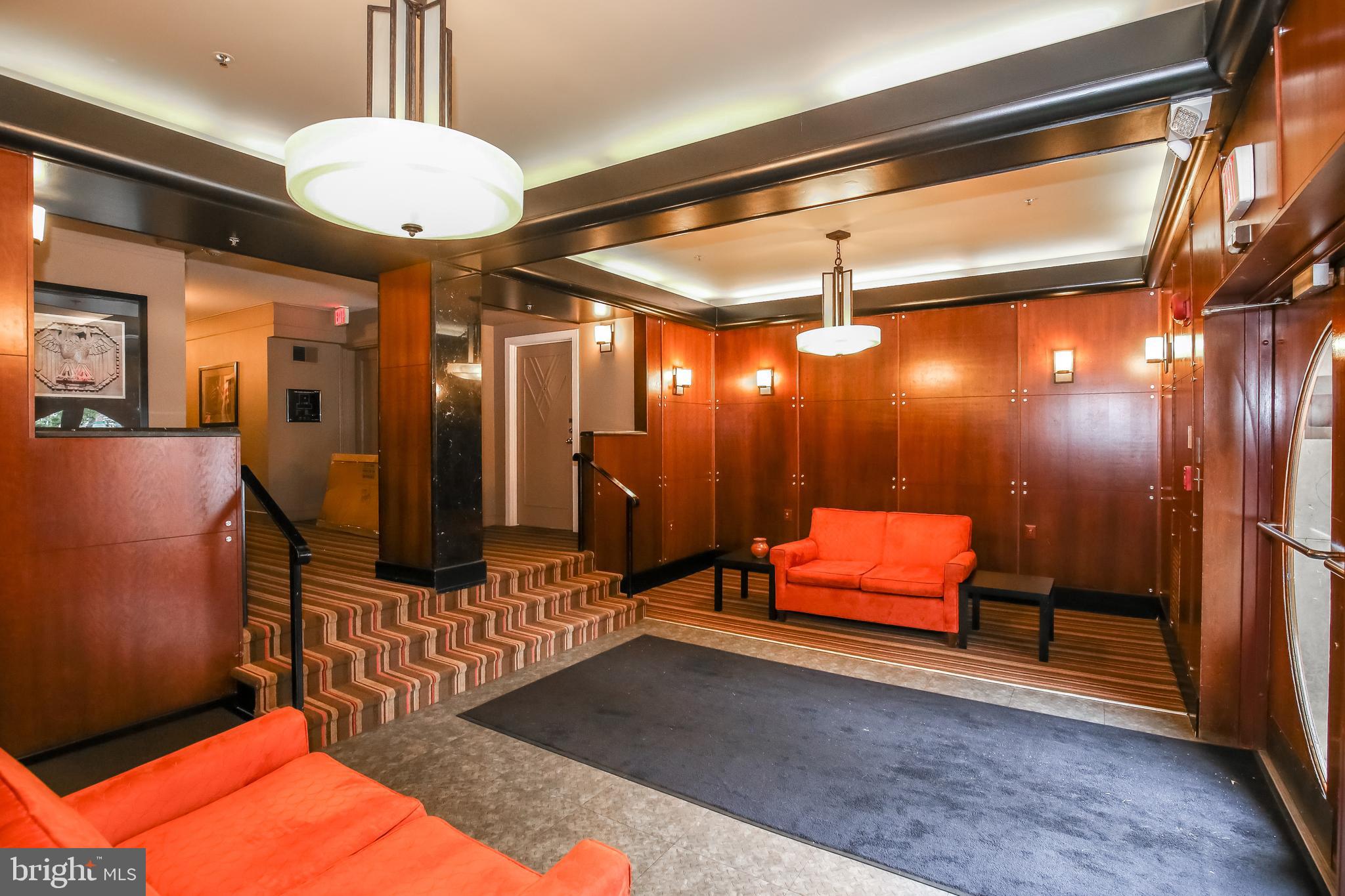 1727 R Street Northwest, Unit 203 Washington, DC 20009 - Photo 14 of 14 a living room with furniture and a chandelier
