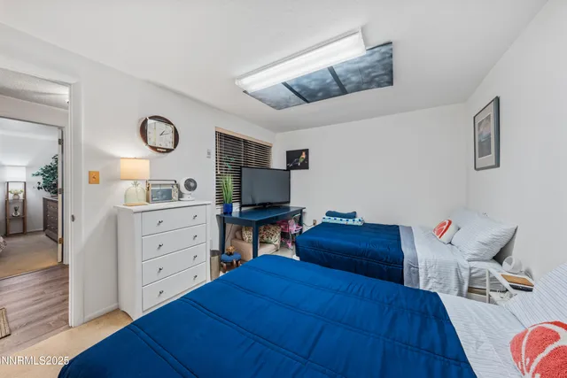 a bedroom with a bed and furniture