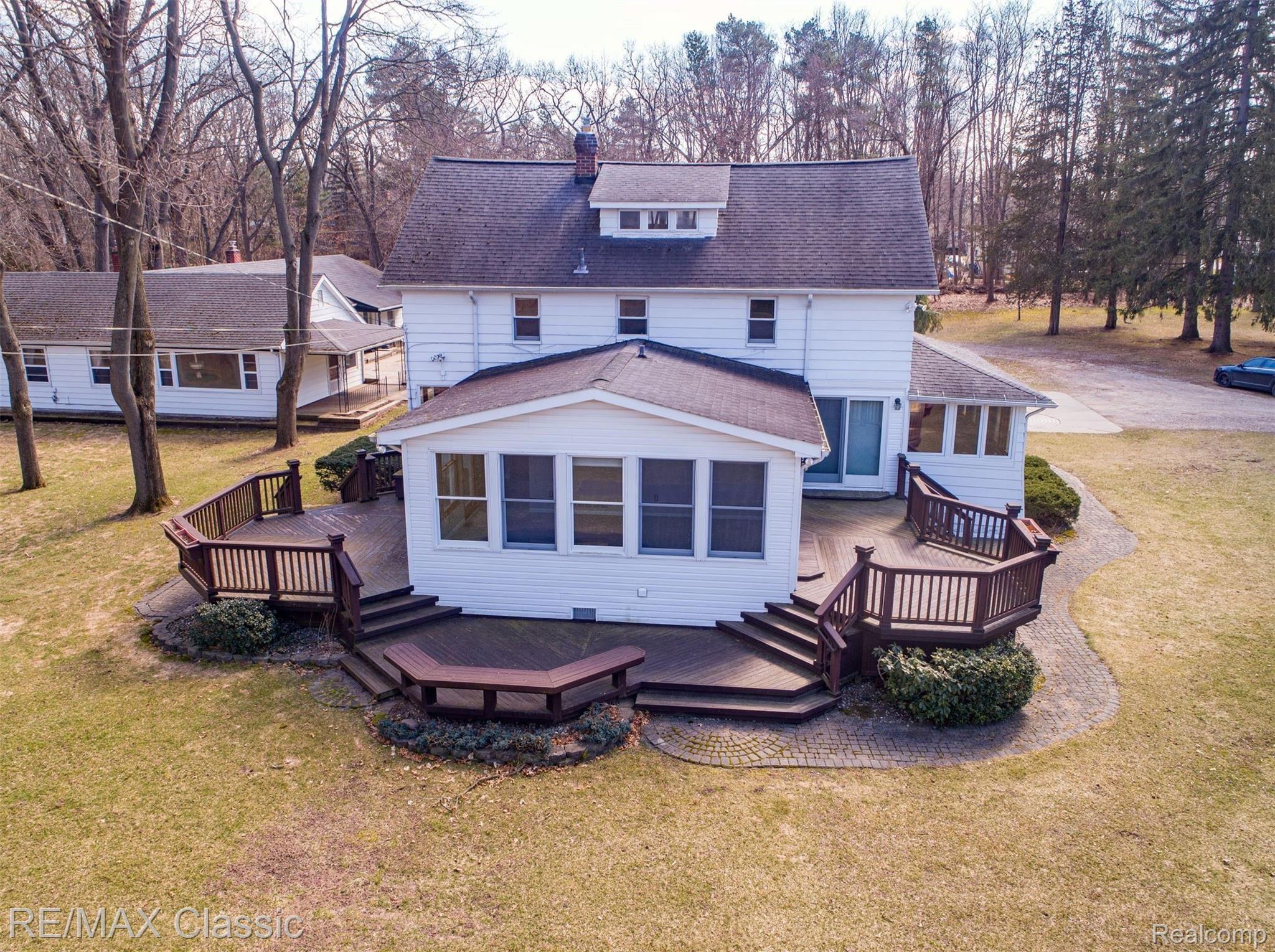 3980 Benstein Road Commerce Township, MI 48382 - Photo 27 of 68 Multilevel decking around the farmhouse!