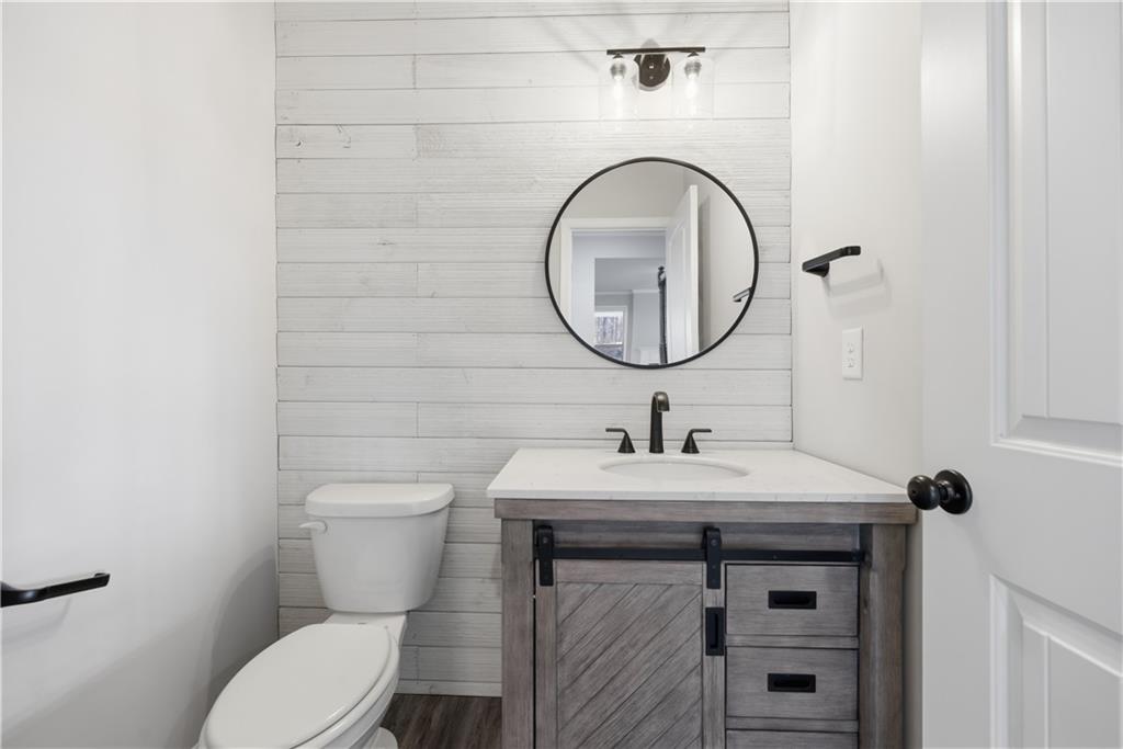 3244 Hawthorne Path Braselton, GA 30517 - Photo 22 of 48 a bathroom with a sink and a toilet