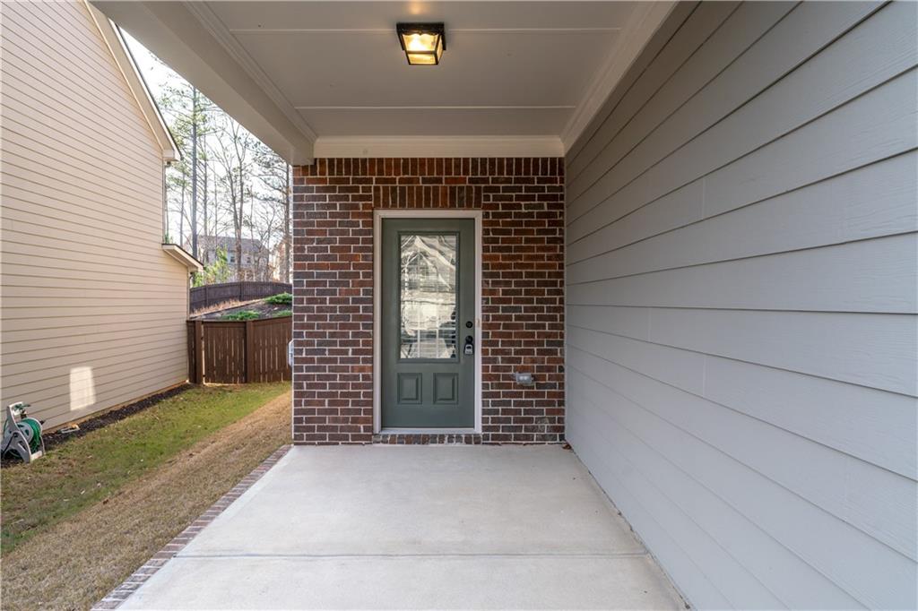 3244 Hawthorne Path Braselton, GA 30517 - Photo 3 of 48 a view of entryway door of the house