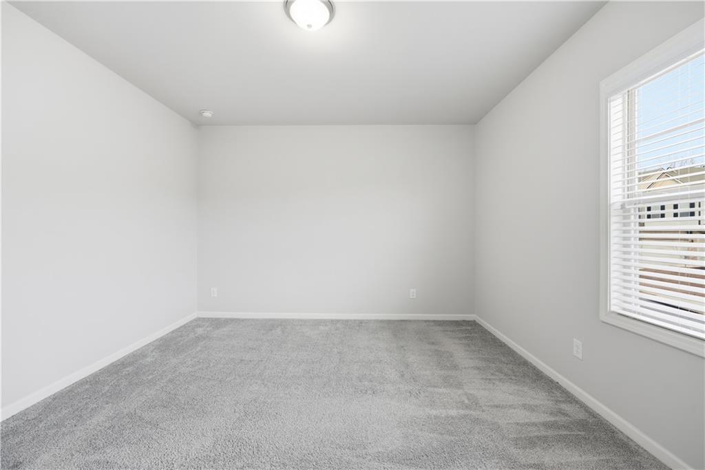 3244 Hawthorne Path Braselton, GA 30517 - Photo 33 of 48 a view of empty room
